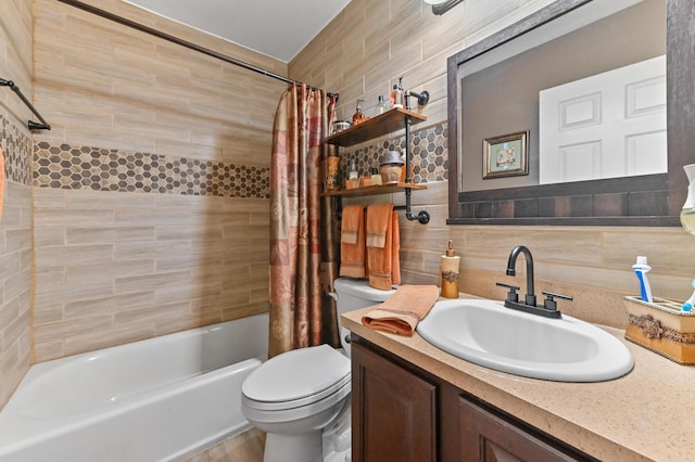 full bath with tile walls, shower / bathtub combination with curtain, backsplash, toilet, and vanity