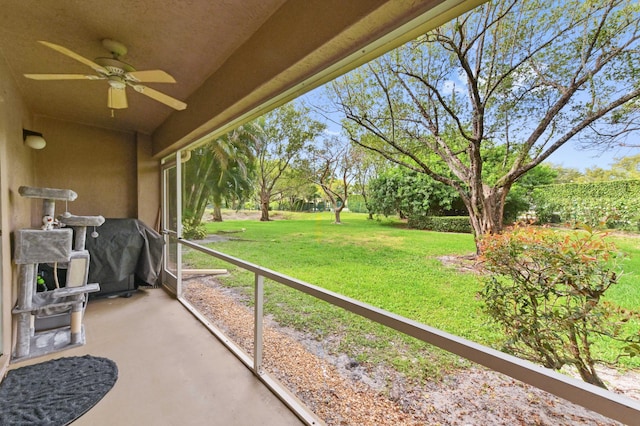 view of patio / terrace featuring a grill and ceiling fan