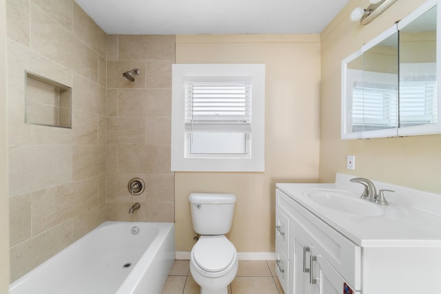 1204 Easter Ave, Fort Pierce, FL 34950 - bathroom featuring vanity, toilet, tile patterned flooring, bathtub / shower combination, and baseboards