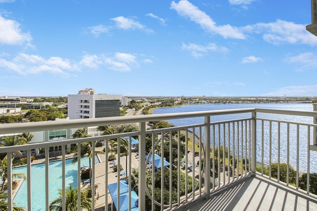 balcony featuring a water view