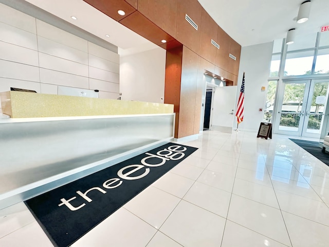 reception area featuring visible vents and french doors