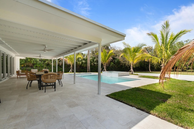 view of swimming pool featuring outdoor dining area, a patio area, ceiling fan, and a lawn