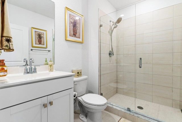 full bath with toilet, a shower stall, and vanity