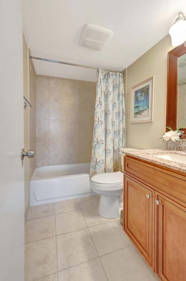 full bath with visible vents, toilet, tile patterned floors, shower / bath combination with curtain, and vanity