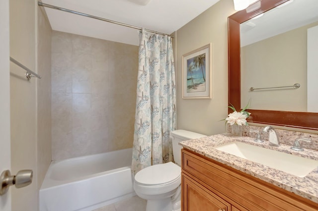 full bathroom featuring toilet, shower / bath combo, vanity, and tile patterned flooring