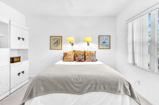 bedroom with light tile patterned flooring