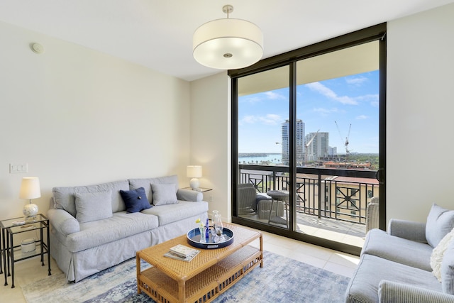 tiled living area featuring a city view and floor to ceiling windows