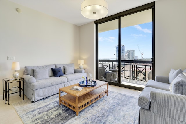 tiled living room with a city view and floor to ceiling windows