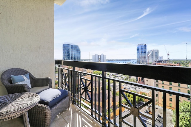 balcony featuring a view of city