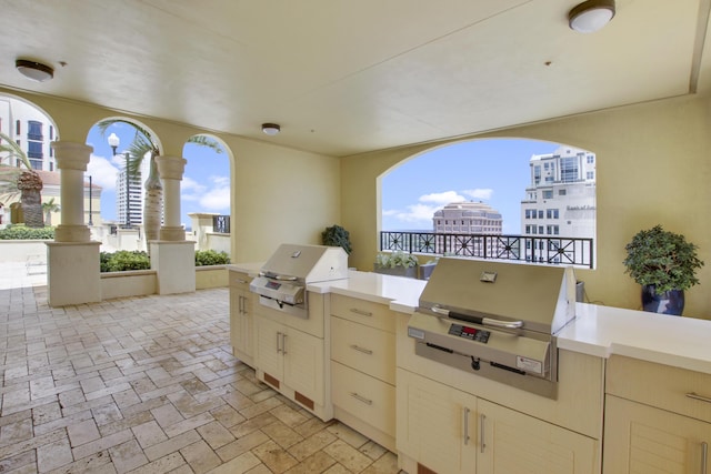 view of patio featuring area for grilling and an outdoor kitchen