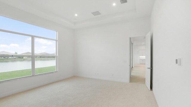 kitchen featuring wine cooler, light wood finished floors, light countertops, backsplash, and baseboards