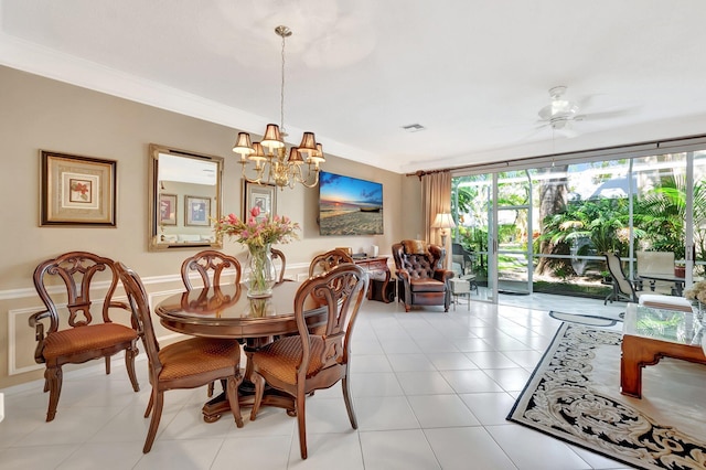 dining area with ornamental molding, light tile patterned flooring, visible vents, and ceiling fan with notable chandelier