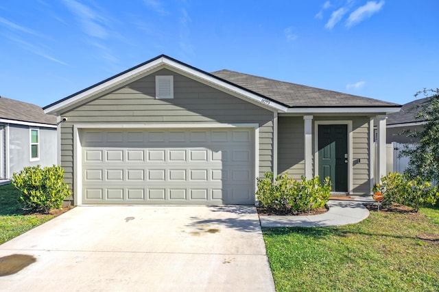 single story home featuring concrete driveway, a garage, and roof with shingles