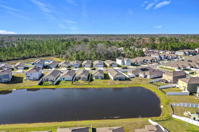 bird's eye view with a residential view and a water view