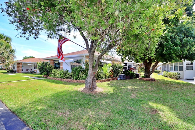 exterior space with a front lawn