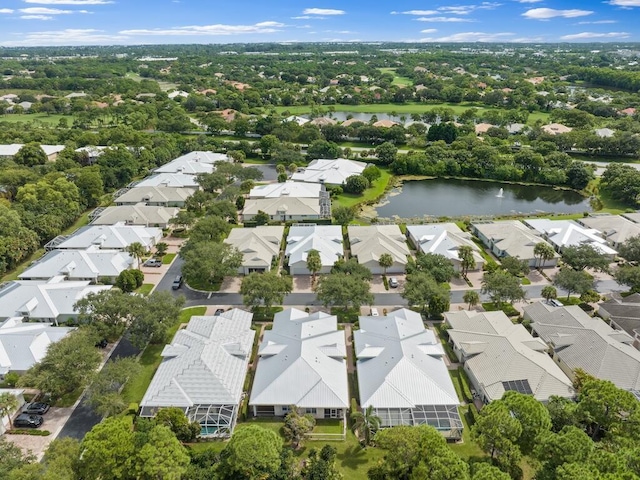 aerial view with a water view and a residential view