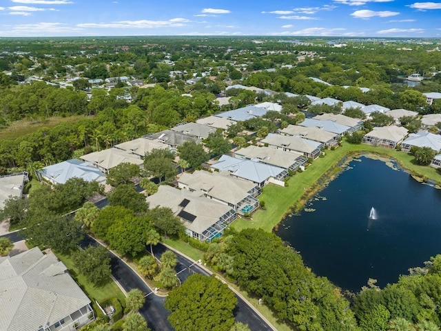 aerial view featuring a water view and a residential view