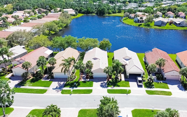 aerial view featuring a water view and a residential view