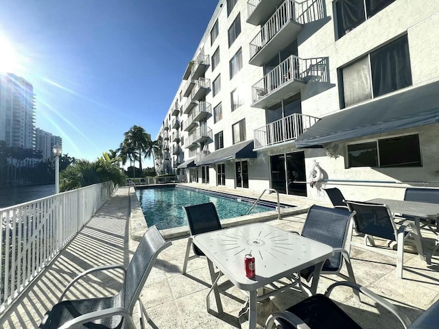 pool featuring a patio area