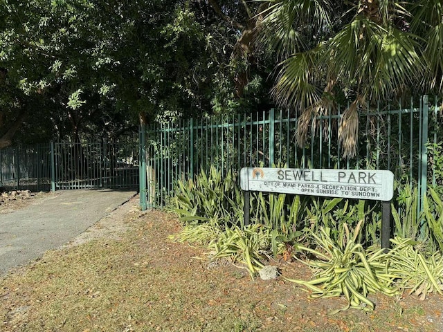 exterior space with a gate and fence