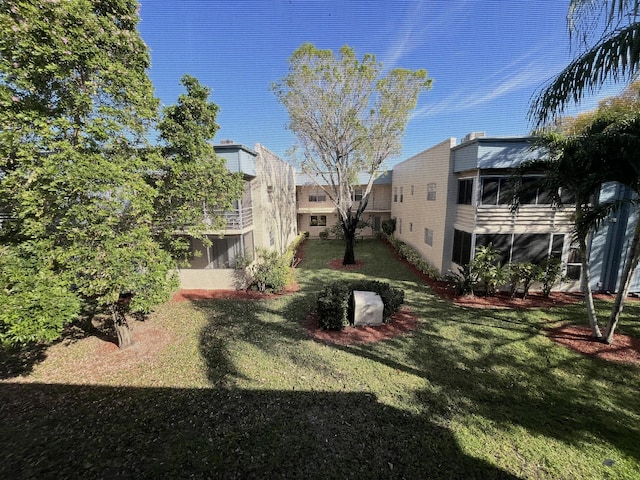 view of yard with a sunroom