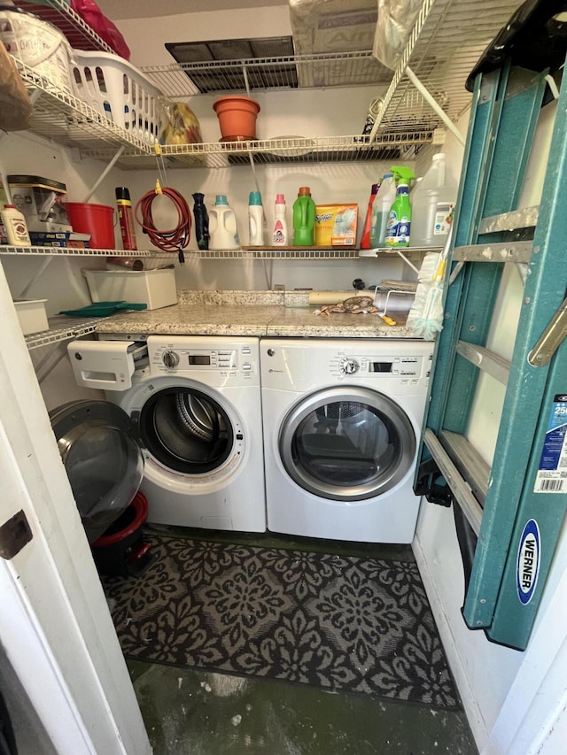 laundry area featuring laundry area and separate washer and dryer