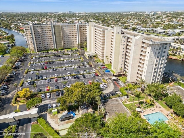 bird's eye view featuring a water view and a city view