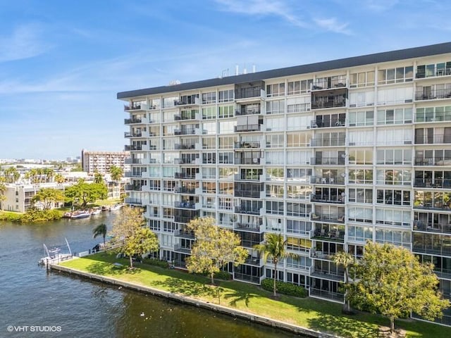 view of property with a water view