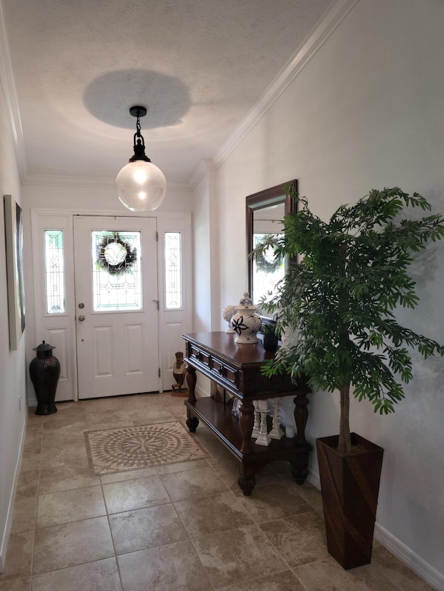 entryway featuring plenty of natural light, crown molding, and baseboards