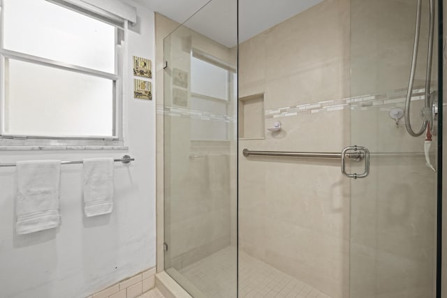 full bathroom featuring a stall shower