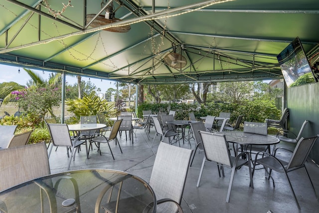 view of patio with a gazebo and outdoor dining space