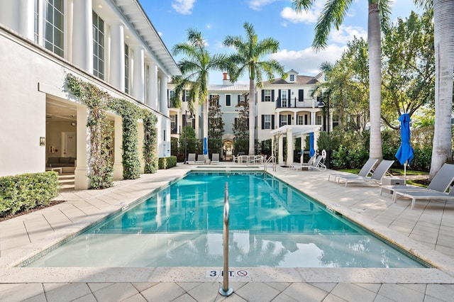 community pool featuring a patio