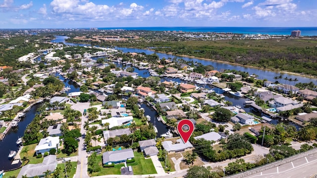 aerial view featuring a residential view and a water view