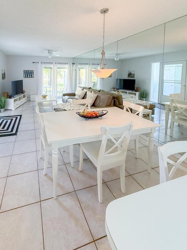 dining space with light tile patterned floors