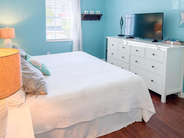 bedroom featuring wood finished floors