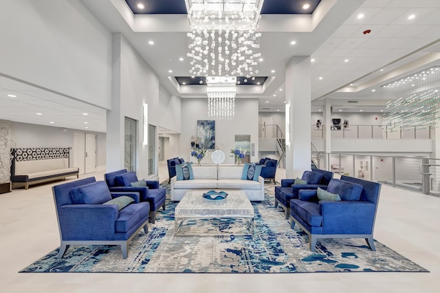 building lobby featuring a towering ceiling and recessed lighting