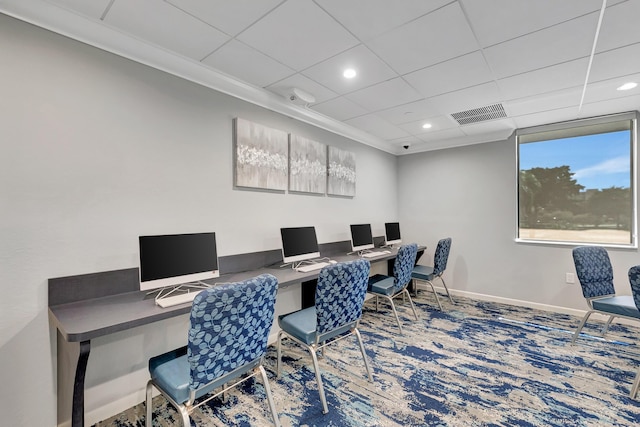carpeted home office with baseboards, recessed lighting, built in desk, and a drop ceiling