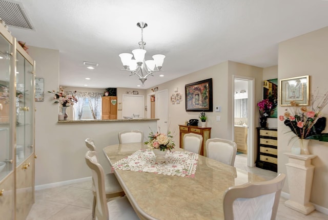 dining space featuring a notable chandelier, light tile patterned floors, recessed lighting, visible vents, and baseboards