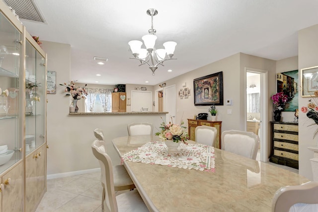 dining space featuring a notable chandelier, light tile patterned floors, recessed lighting, visible vents, and baseboards