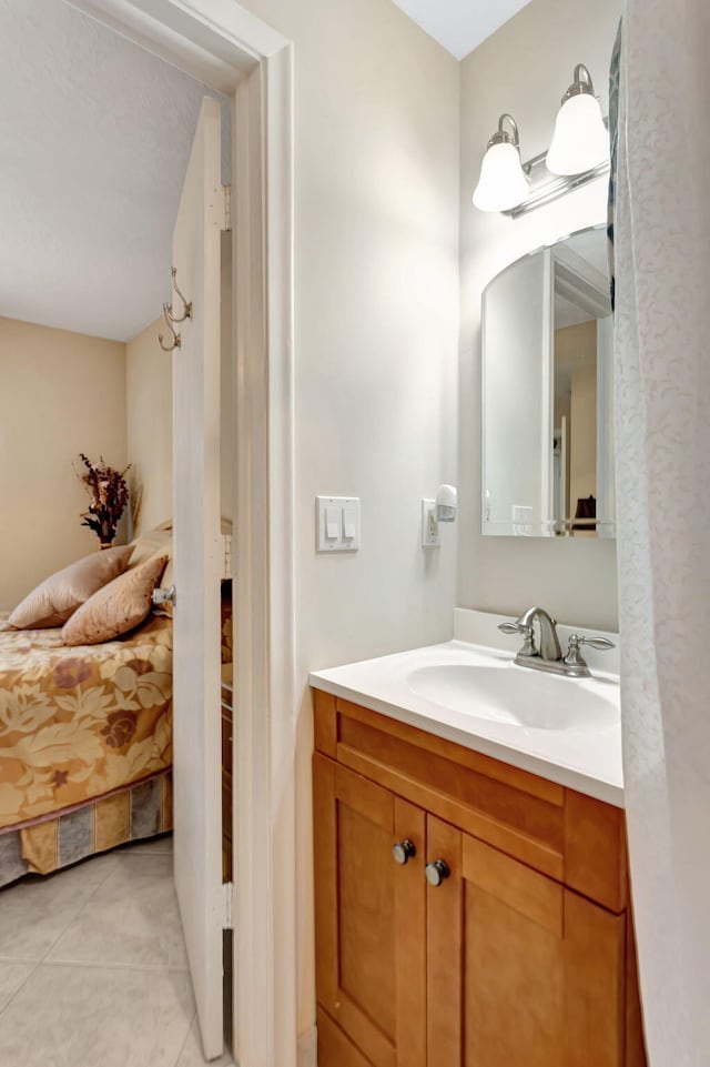 bathroom with vanity and tile patterned floors