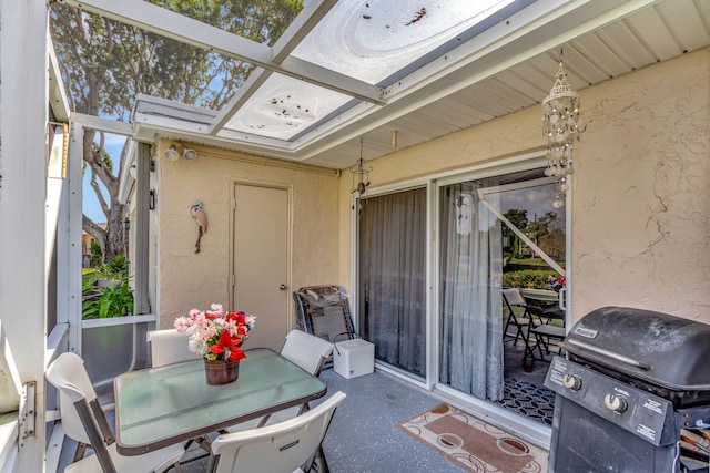 view of patio featuring grilling area and outdoor dining space