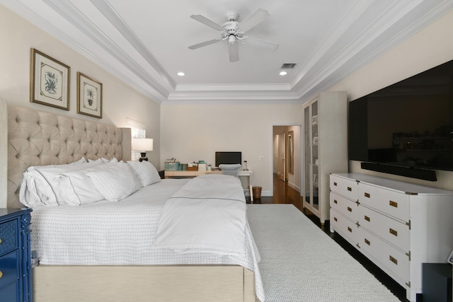 bedroom with visible vents, ornamental molding, a tray ceiling, recessed lighting, and ceiling fan