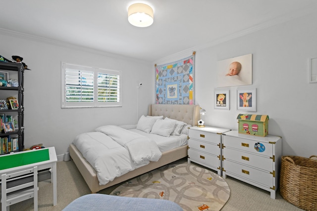 bedroom with light carpet and crown molding