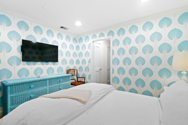 bedroom featuring visible vents, recessed lighting, wallpapered walls, and ornamental molding