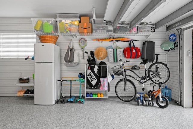 garage featuring freestanding refrigerator