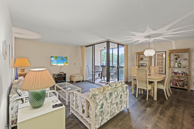 living area featuring dark wood-style floors and floor to ceiling windows