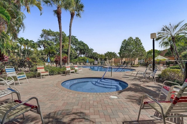 community pool featuring a patio