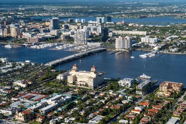 drone / aerial view with a water view and a city view