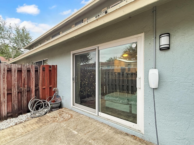 view of patio with fence