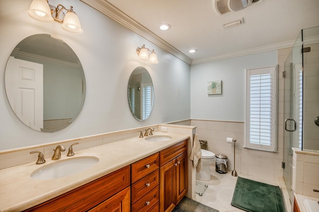 bathroom featuring a shower with door, tile walls, and a sink